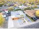 Aerial view of home with gray roof, orange garage doors, and landscaped yard at 8114 E Arlington Rd, Scottsdale, AZ 85250