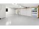 Spacious garage with windows in the doors and epoxy flooring at 8114 E Arlington Rd, Scottsdale, AZ 85250