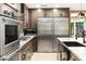 Well-equipped kitchen boasting stainless steel appliances and sleek countertops at 8114 E Arlington Rd, Scottsdale, AZ 85250