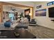 Living room with an open floor plan, stylish furnishings, and a seamless transition to the adjacent kitchen area at 8114 E Arlington Rd, Scottsdale, AZ 85250