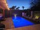 Relaxing backyard featuring a pool, spa, and lounge chairs at 8114 E Arlington Rd, Scottsdale, AZ 85250