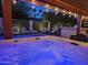 Inviting hot tub with a clear view of the pool and backyard landscaping at 8114 E Arlington Rd, Scottsdale, AZ 85250