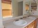 Dual sink bathroom vanity with tile flooring and a large mirror at 8163 E Posada Ave, Mesa, AZ 85212