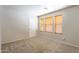 Neutral bedroom featuring plush carpet and wood blinds at 8163 E Posada Ave, Mesa, AZ 85212
