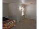 Bedroom with carpet, a large window and a closet at 8163 E Posada Ave, Mesa, AZ 85212