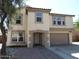 Charming two-story home with a neutral color scheme and a well-maintained front yard at 8163 E Posada Ave, Mesa, AZ 85212