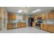 Bright kitchen with stainless steel appliances, wood cabinets, and ample countertop space at 8163 E Posada Ave, Mesa, AZ 85212