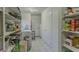 Pantry with shelves stocked full of canned and dry goods plus an additional storage closet at 8163 E Posada Ave, Mesa, AZ 85212