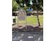 Private community park featuring walking paths, green space, playground, and a picnic area at 8163 E Posada Ave, Mesa, AZ 85212