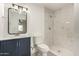 Modern bathroom featuring marble accents and bright blue vanity at 833 S Toltec --, Mesa, AZ 85204