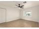 Bedroom featuring neutral paint, tiled flooring, and bright natural light at 833 S Toltec --, Mesa, AZ 85204