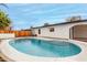 This is a sparkling in-ground pool surrounded by white concrete and a secure fence at 833 S Toltec --, Mesa, AZ 85204