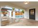 Covered poolside patio featuring an outdoor grill, rod iron gate, and access door at 833 S Toltec --, Mesa, AZ 85204