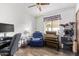 Cozy living area with recliner chair, window with blinds, piano, and desk at 848 W Keating Ave, Mesa, AZ 85210