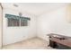 Standard bedroom with a desk, window and neutral carpet at 906 N Roosevelt Cir, Scottsdale, AZ 85257