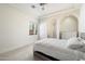 Minimalist bedroom with neutral colors and plush carpet at 10050 N 58Th St, Paradise Valley, AZ 85253