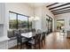 Bright dining area with coffered ceiling and large windows overlooking the backyard at 10050 N 58Th St, Paradise Valley, AZ 85253