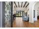 Elegant living room with hardwood floors, high ceilings, and a view of the backyard at 10050 N 58Th St, Paradise Valley, AZ 85253