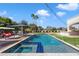 Inviting pool with spa and water features, surrounded by lush landscaping and ample seating areas at 10050 N 58Th St, Paradise Valley, AZ 85253
