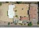Aerial view of the property showing layout, grounds and surrounding area at 10105 E Cactus Rd, Scottsdale, AZ 85260