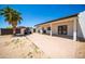 Expansive backyard featuring a covered patio, and an outdoor built in bbq area at 10105 E Cactus Rd, Scottsdale, AZ 85260