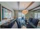 Elegant dining room with view of the living room; ideal for entertaining at 10105 E Cactus Rd, Scottsdale, AZ 85260