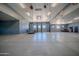 This large garage has car lifts, bright lighting and space for an office or workspace at 10105 E Cactus Rd, Scottsdale, AZ 85260