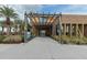 Welcoming entrance to Eastmark Home Finding Center with modern architecture and desert landscaping at 10156 E Radiant Ave, Mesa, AZ 85212