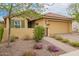 Cozy single level home with charming curb appeal, mature landscaping, and gated courtyard at 10156 E Radiant Ave, Mesa, AZ 85212