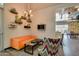 Cozy lounge area with modern furnishings, unique decor, and a relaxing atmosphere, great for socializing at 10156 E Radiant Ave, Mesa, AZ 85212