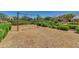 Charming community playground featuring a swing set nestled in a garden-like setting at 10156 E Radiant Ave, Mesa, AZ 85212