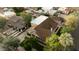 Scenic aerial perspective of a well-maintained home with a beautifully landscaped yard and mature trees at 102 W Almeria Rd, Phoenix, AZ 85003