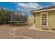Backyard featuring a trampoline, guest house and stone landscaping, a relaxing space at 102 W Almeria Rd, Phoenix, AZ 85003