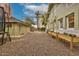 Spacious backyard featuring a trampoline, a guest house and stone landscaping at 102 W Almeria Rd, Phoenix, AZ 85003