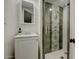 Stylish bathroom featuring a decorative tile shower and modern vanity at 102 W Almeria Rd, Phoenix, AZ 85003