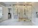 Spacious modern bathroom featuring a glass shower with marble tiling and double shower heads at 102 W Almeria Rd, Phoenix, AZ 85003