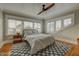 Bright bedroom with natural light, hardwood floors and checker rug at 102 W Almeria Rd, Phoenix, AZ 85003