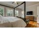 Spacious main bedroom with natural light, hardwood flooring, and modern decor at 102 W Almeria Rd, Phoenix, AZ 85003