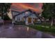 Beautiful exterior view of the home at dusk, showcasing its architectural charm and curb appeal at 102 W Almeria Rd, Phoenix, AZ 85003
