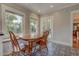 Cozy breakfast nook with banquette seating, natural light, and patterned floors at 102 W Almeria Rd, Phoenix, AZ 85003