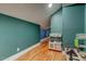 Spacious play area with wooden floors and a small play kitchen set at 102 W Almeria Rd, Phoenix, AZ 85003