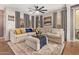 Cozy living room with large sectional sofa, stylish rug, and natural light at 1059 S Cheshire Ln, Gilbert, AZ 85296