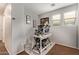 Well lit office with neutral tones, a modern desk and updated decor at 1059 S Cheshire Ln, Gilbert, AZ 85296