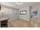 Bright living room with tile floors and recessed lighting fixtures at 10772 W Woodland Ave, Avondale, AZ 85323