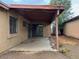 Spacious covered patio extending from the back of the home at 11169 N 82Nd Ln, Peoria, AZ 85345