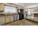 Kitchen features granite countertops, stainless steel dishwasher, and matching cabinets at 12125 N 91St Way, Scottsdale, AZ 85260