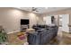 Open-concept living area with comfortable seating, tile flooring, and lots of natural light throughout the space at 12125 N 91St Way, Scottsdale, AZ 85260