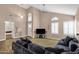 Open floor plan featuring neutral walls, carpeted living area, tiled entryway, and many windows for natural light at 12125 N 91St Way, Scottsdale, AZ 85260
