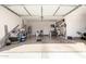 Spacious and organized garage with ample storage and parking space at 12508 W Highland Ave, Litchfield Park, AZ 85340