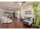 Inviting living room features hardwood floors, neutral colors, and plenty of natural light at 12508 W Highland Ave, Litchfield Park, AZ 85340